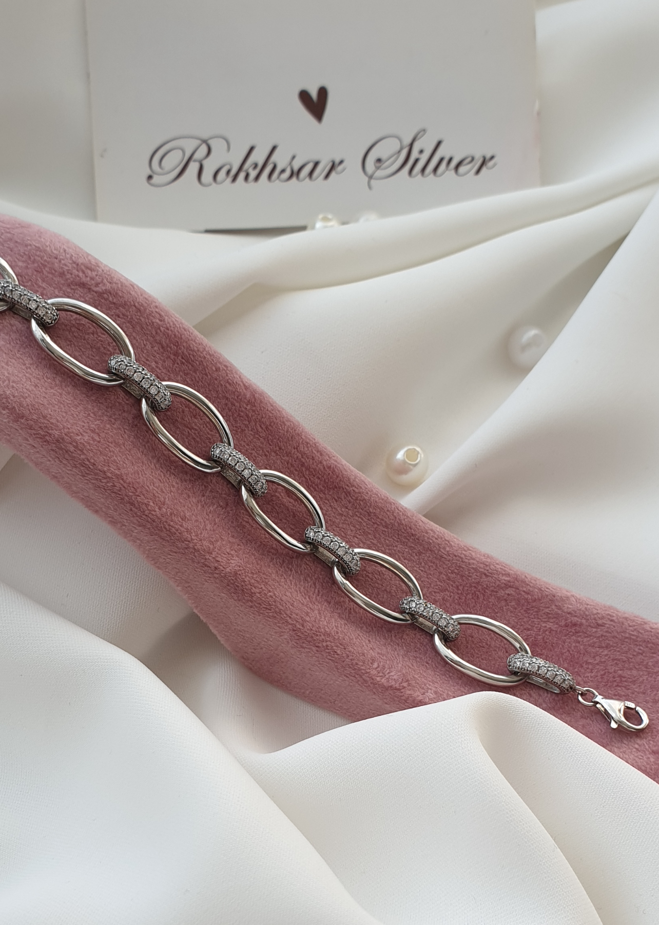 دستبند نقره کارتیر مدل حلقه ای و جواهری