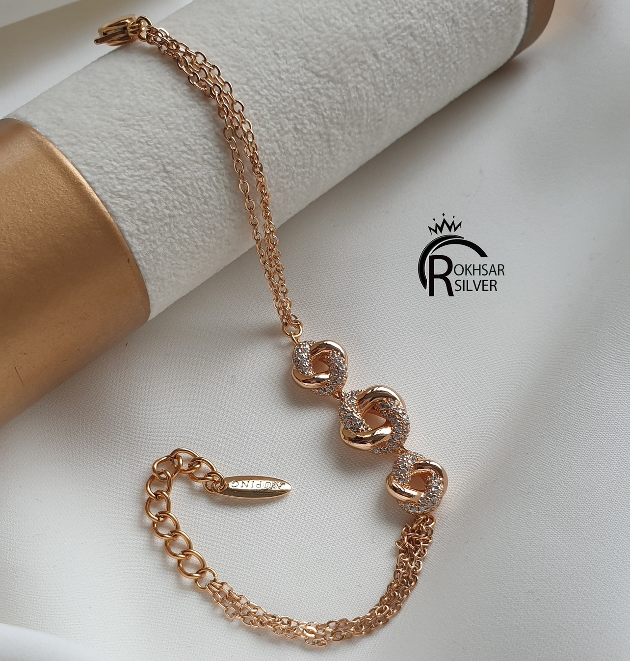 دستبند زنانه ژوپینگ مدل سه گره طرح طلا کد۲۲۰۶