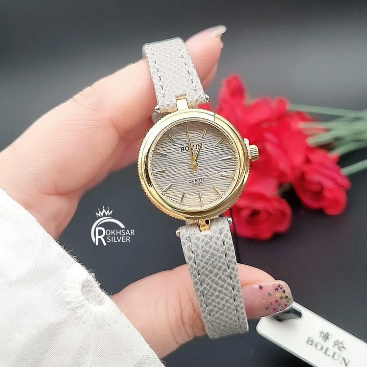 ساعت مچی زنانه با صفحه طوسی و قاب طلایی و بند چرم طوسی کدRS_2431