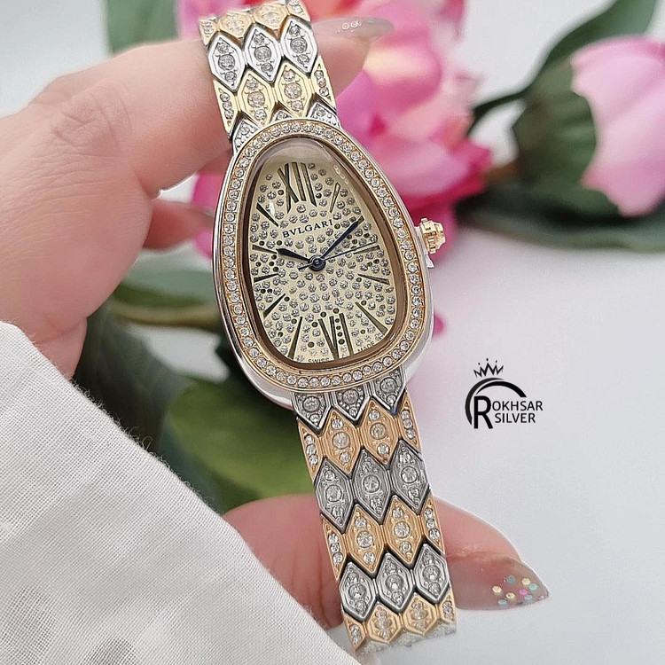 ساعت مچی زنانه بولگاری مجلسی با صفحه و بند نگیندار دورنگ سفید طلایی کد RS_2561